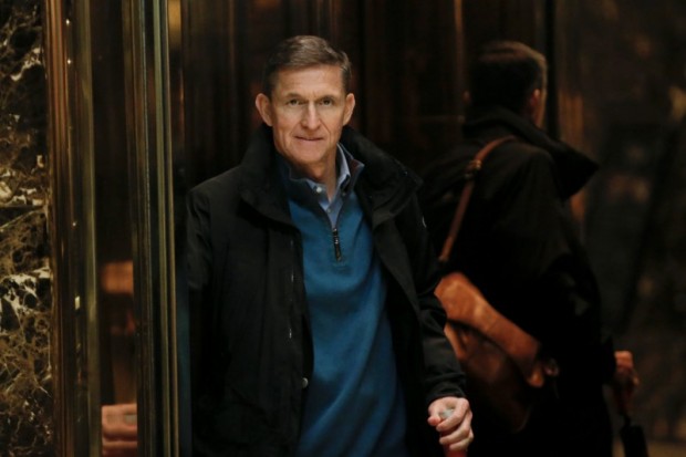 Retired U.S. Army Lieutenant General Michael Flynn boards an elevator as he arrives at Trump Tower where U.S. President-elect Donald Trump lives in New York