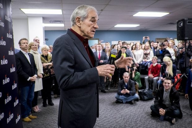 DES MOINES, IA - FEBRUARY 1: Former Congressman Ron Paul introduces his son, Senator Rand Paul (R-TX) during a caucus day rally at the Des Moines campaign headquarters on February 1, 2016 in Des Moines, Iowa. The Presidential hopeful was accompanied by his wife, Kelly, mother, Carol Wells and his father, former Congressman Ron Paul. Pauls were there to thank all the staff and volunteers for all their hard work in Iowa. (Photo by Pete Marovich/Getty Images)