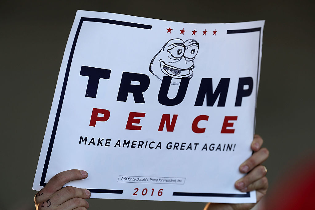 What the media would describe as an ultra-rare white nationalist symbol, drawn on a Trump-Pence campaign sign (Getty Images)