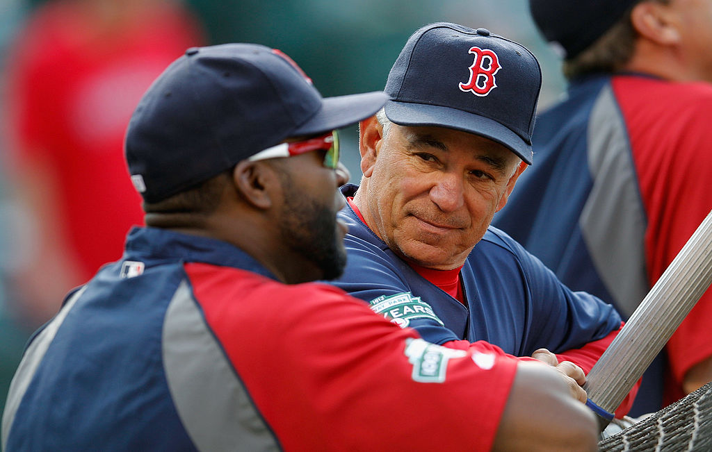 BALTIMORE, MD - MAY 22: Manager Bobby Valentine (R) and David Ortiz #34 of the Boston Red Sox look on during batting practice before the start of the Red Sox game against the Baltimore Orioles at Oriole Park at Camden Yards on May 22, 2012 in Baltimore, Maryland. (Photo by Rob Carr/Getty Images)
