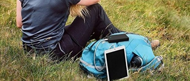 This girl can use her electronics outside because she brought her Aukey power bank (Photo via Amazon)