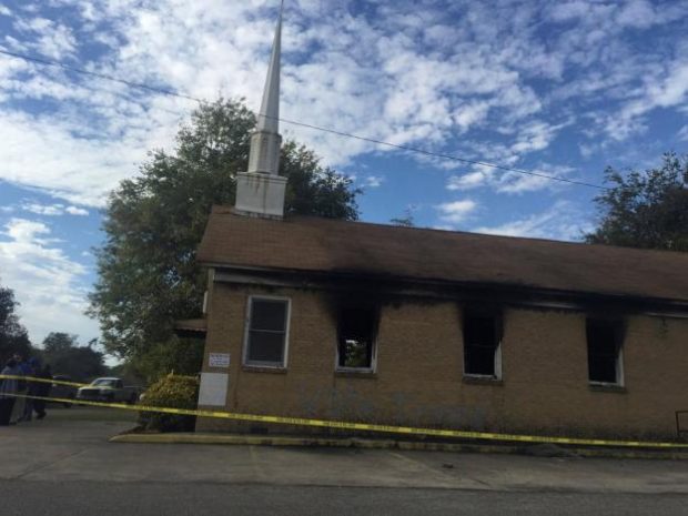 Hopewell Baptist Church is damaged by fire and graffiti in Greenville, Mississippi, U.S., November 2, 2016. Courtesy Angie Quezada/Delta Daily News via REUTERS