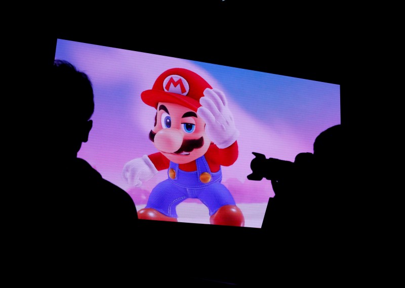 Nintendo's game character Super Mario is seen on a screen at the presentation ceremony of Nintendo's new game console Switch in Tokyo, Japan January 13, 2017. REUTERS/Kim Kyung-Hoon