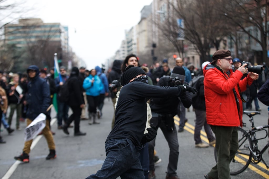 Bricks being thrown at police by protesters – Daily Caller – Grae Stafford