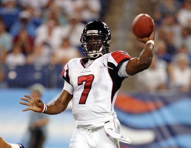 Falcons Michael Vick #7 throws during first half action between the Atlanta Falcons and the Tennessee Titans on August 26, 2006 at The Coliseum in Nashville, Tennessee. (Photo by Joe Murphy/NFLPhotoLibrary/Getty Images)