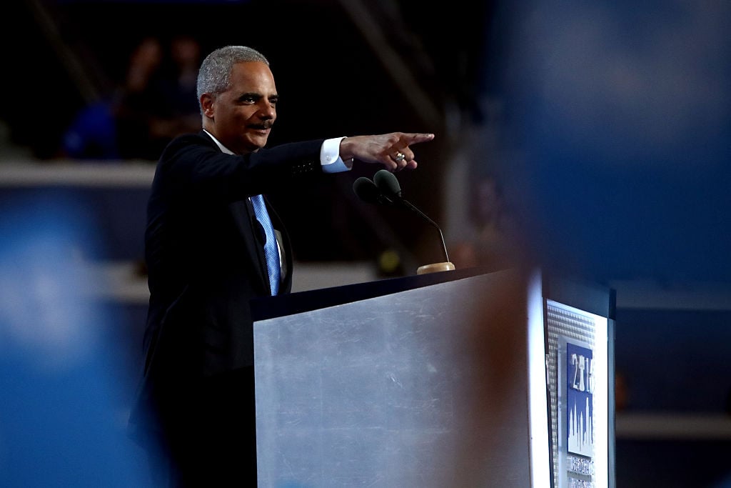 Eric Holder points to the crowd on the second day of the Democratic National Convention at the Wells Fargo Center onJuly 26, 2016 in Philadelphia, Pennsylvania (Getty Images)