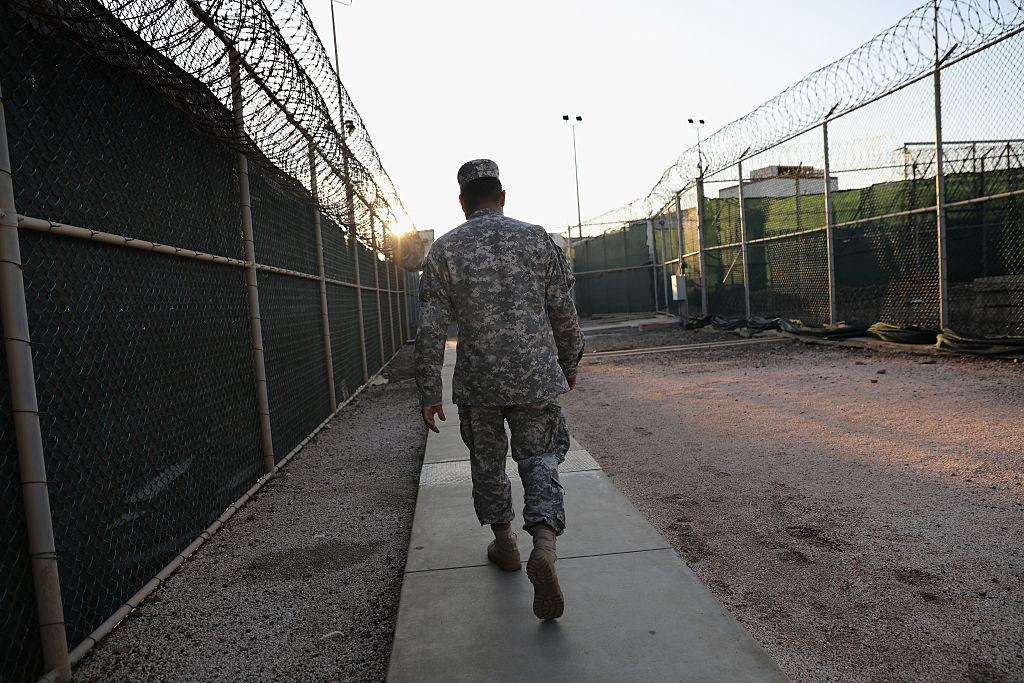 A guard walks into the max security 'Gitmo' detention center (Getty Images)