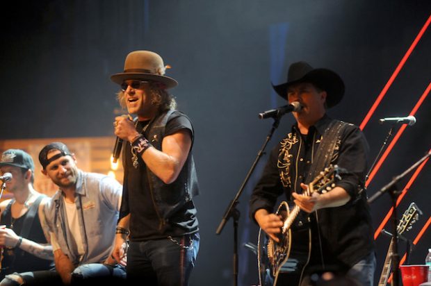 CHICAGO, IL - NOVEMBER 09: Big Kenny and John Rich of Big & Rich perform at CBS RADIO’s second annual Stars and Strings concert at The Chicago Theatre on November 9, 2016 in Chicago, Illinois. (Photo by Timothy Hiatt/Getty Images)