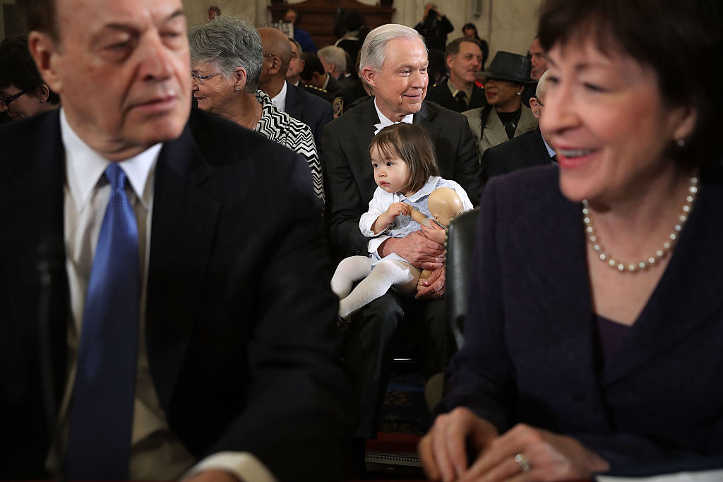 Jeff Sessions sits with his granddaughter (Getty Images)