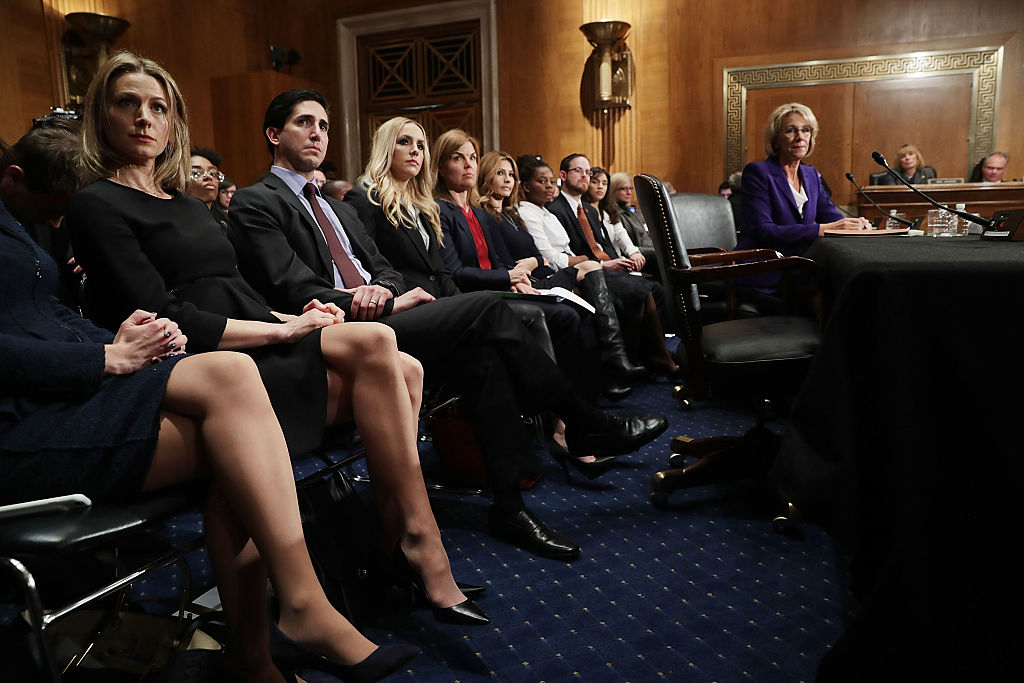 Betsy Devos and her family attend a Senate Health & Education Committee confirmation hearing (Getty Images)