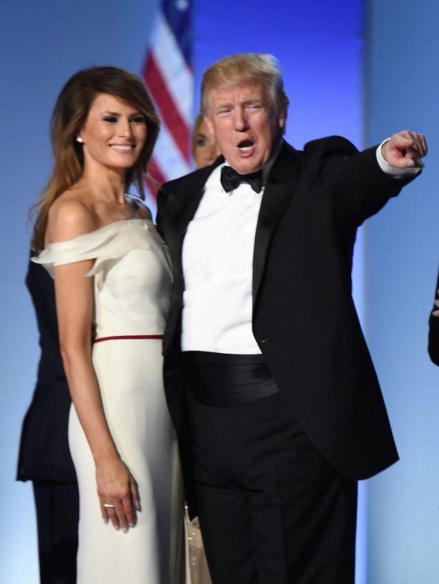 US President Donald Trump and First Lady Melania Trump take the stage at the Freedom Inaugural Ball, January 20, 2017, in Washington, DC. / AFP / Robyn Beck