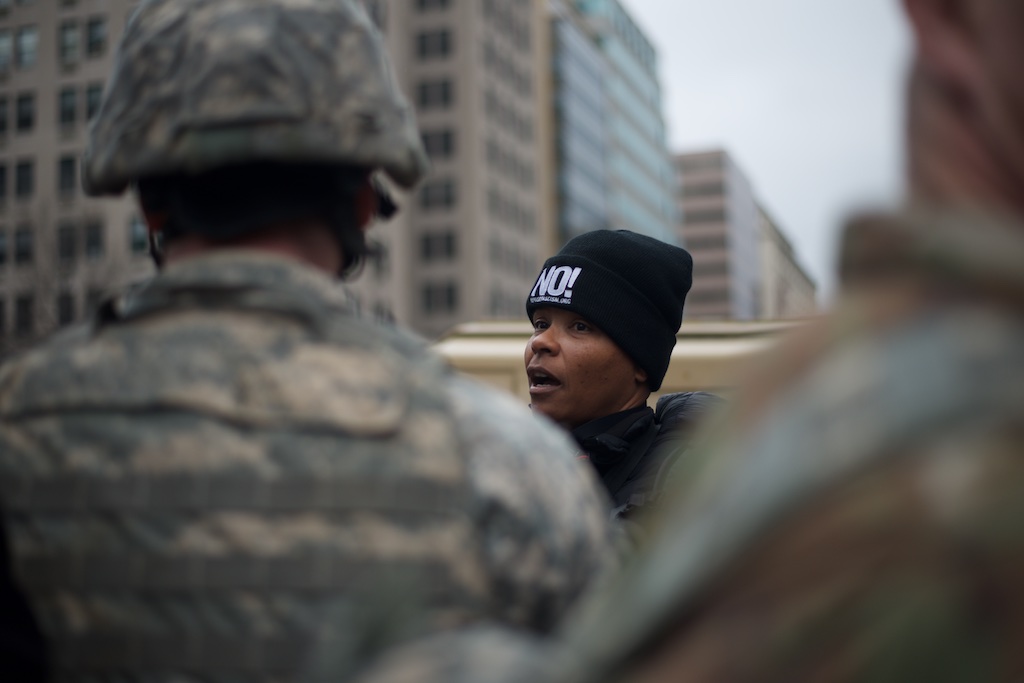 Protester speaks to a National Guard soldier on a security line – Daily Caller – Abbey Jaroma