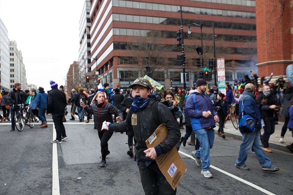 Protesters fleeing from concussion grenades thrown by police – Daily Caller – Grae Stafford