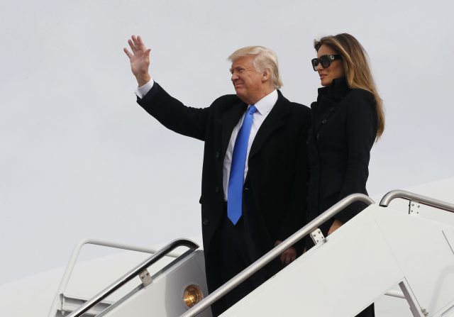 President-elect Donald Trump and his wife Melania arrive at Joint Base Andrews outside Washington, January 19, 2017, one day before his inauguration as the nation's 45th president. REUTERS/Jonathan Ernst