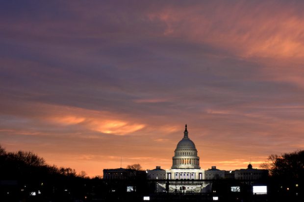 The sun rises over the U.S. Capitol on the National Mall before U.S. President-elect Donald Trump is to be sworn in in Washington, U.S., January 20, 2017. REUTERS/James Lawler Duggan - RTSWGOJ