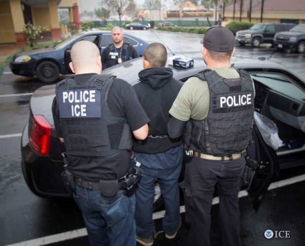 U.S. Immigration and Customs Enforcement (ICE) officers detain a suspect as they conduct a targeted enforcement operation in Los Angeles, California, U.S. on February 7, 2017. Courtesy Charles Reed/U.S. Immigration and Customs Enforcement via REUTERS 