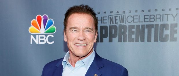 Host Arnold Schwarzenegger poses after a panel for "The New Celebrity Apprentice" in Universal City, California, December 9, 2016. REUTERS/Danny Moloshok