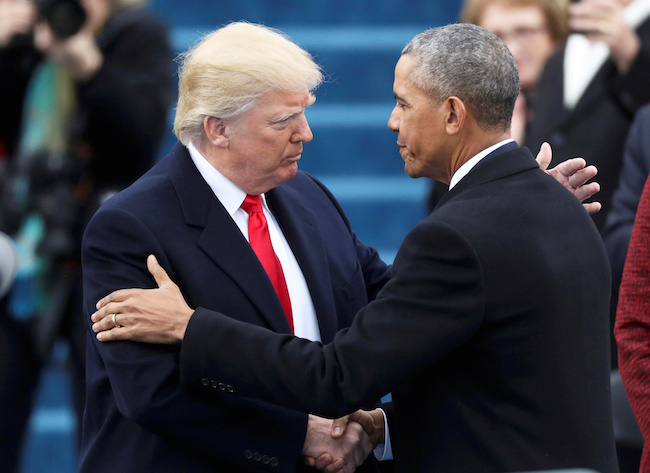 FILE -- President Barack Obama greets President elect Donald Trump at inauguration ceremonies swearing in Donald Trump as the 45th president of the United States on the West front of the U.S. Capitol in Washington, January 20, 2017. REUTERS/Carlos Barria