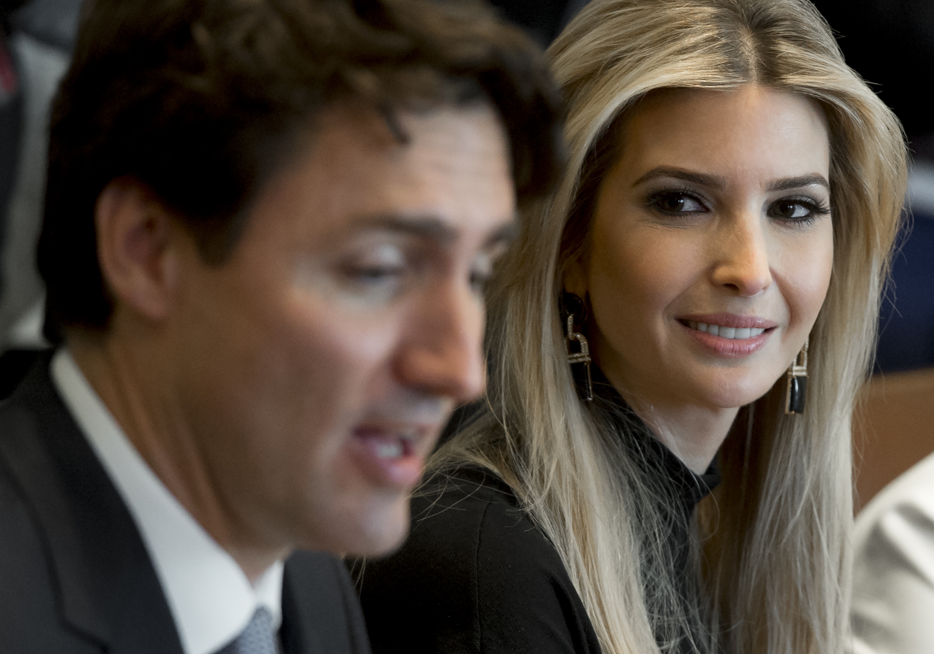 Canadian Prime Minister Justin Trudeau speaks alongside Ivanka Trump, daughter of US President Donald Trump, during a roundtable discussion on women entrepreneurs and business leaders in the Cabinet Room of the White House in Washington, DC, February 13, 2017. SAUL LOEB/AFP/Getty Images