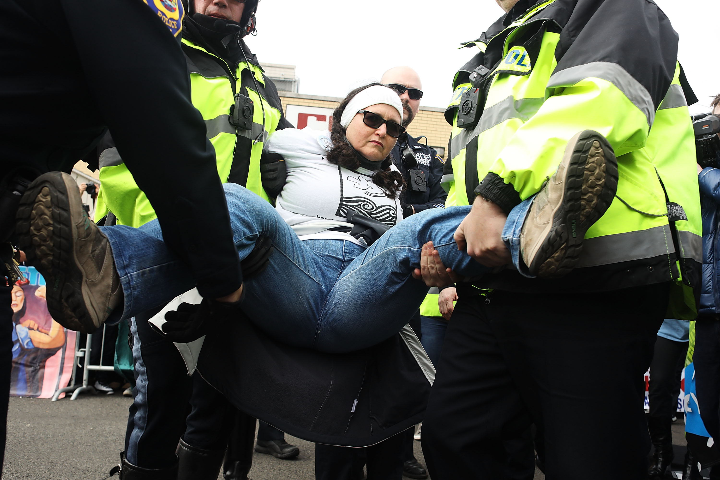 Police remove a protester from ICE detention center in NJ (Getty Images)