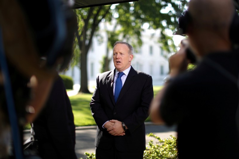 FILE PHOTO: White House Press Secretary Sean Spicer speaks during an interview with Reuters at the White House in Washington, U.S., on April 28, 2017. REUTERS/Carlos Barria/File Photo