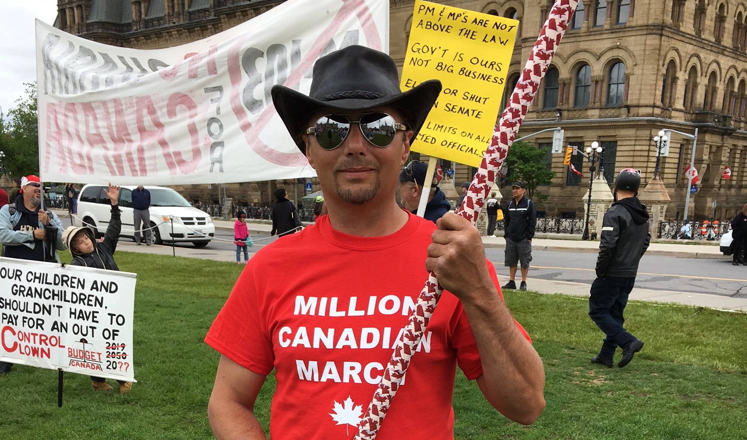 Million Canadian Deplorables March organizer Mike Waine stands in front of Canada's Parliament Hill. Daily Caller photo