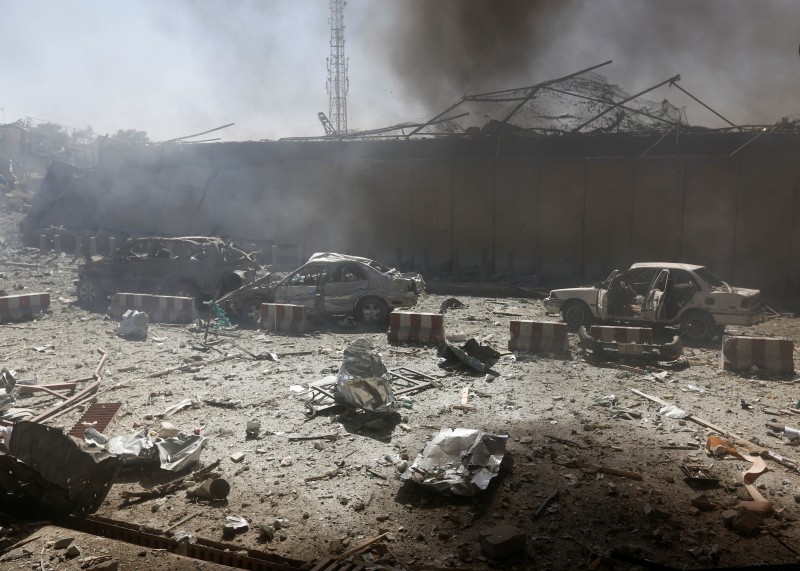 Damaged cars are seen after a blast in Kabul, Afghanistan.REUTERS/Omar Sobhani