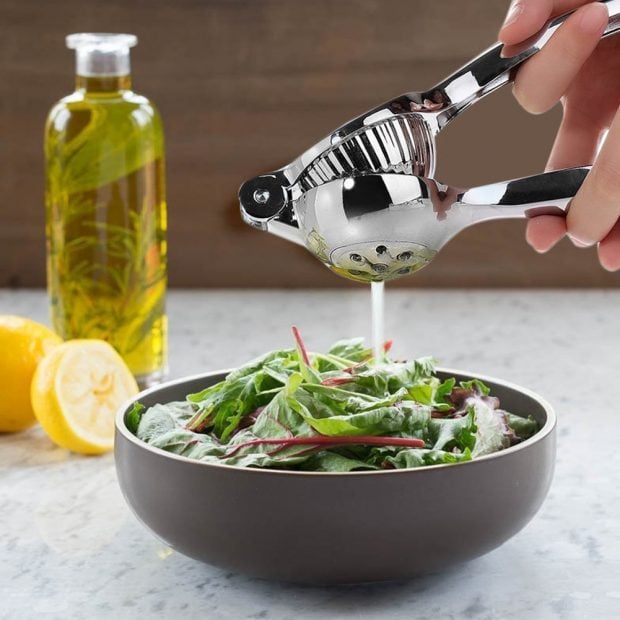 Look how easy your life can be with this awesome lemon squeezer (Photo via Amazon)