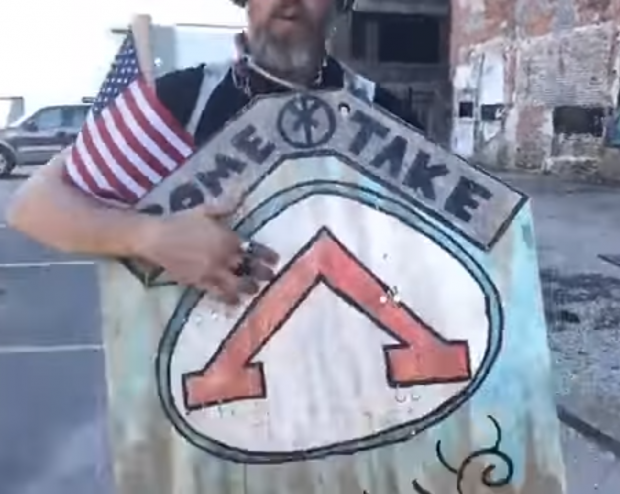 Nicholas Dean at Confederate Monument Protest Showing His Controversial Regalia (YouTube screencap)