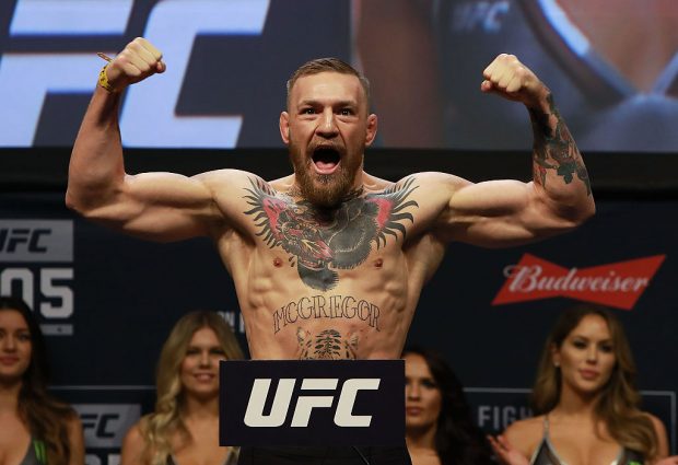 UFC Featherweight Champion Conor McGregor reacts during UFC 205 Weigh-ins at Madison Square Garden on November 11, 2016 in New York City. (Photo by Michael Reaves/Getty Images)