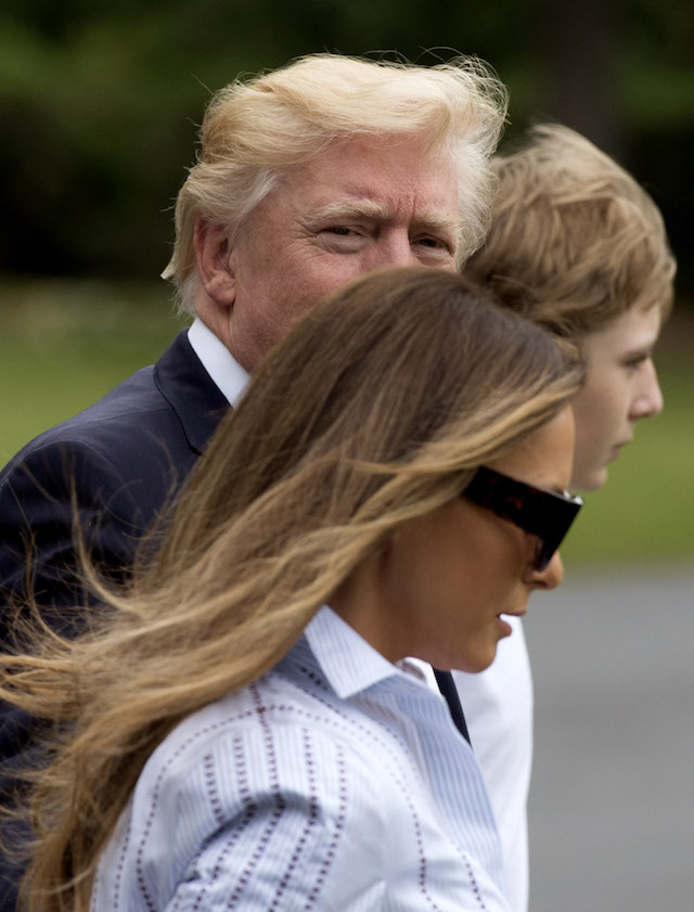 WASHINGTON, DC - JUNE 17: (AFP OUT) U.S. President Donald J. Trump boards Marine One with first lady Melania Trump and their son Barron Trump, as they depart the White House for Camp David, June 17, 2017 in Washington, DC. (Photo by Molly Riley -Pool/Getty Images
