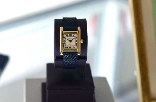 A Signed Cartier watch belonging to Jackie Kennedy dubbed the "The Jacqueline Kennedy Onassis Cartier Tank" on display at Christie's in New York before the Rare Watches and American Icons New York sale. (Photo:Getty)