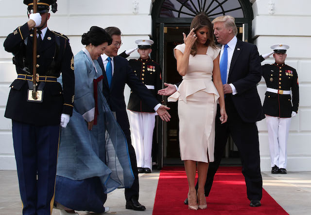 WASHINGTON, DC - JUNE 29: U.S. President Donald Trump (R) and first lady Melania Trump (3rd L) welcome South Korean President Moon Jae-in (2nd L) and his wife Kim Jung-sook (L) during an arrival at the South Portico of the White House June 29, 2017 in Washington, DC. President Moon is on a three-day visit in Washington. (Photo by Alex Wong/Getty Images)