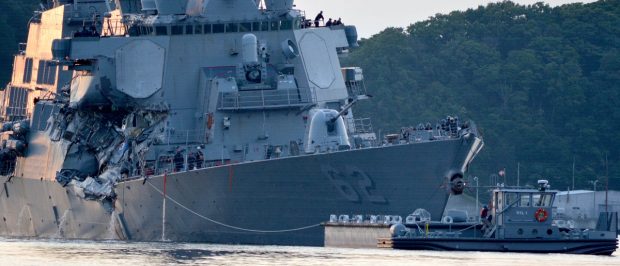 The U.S. Navy Arleigh Burke-class guided-missile destroyer USS Fitzgerald returns to Fleet Activities (FLEACT) Yokosuka following a collision with a merchant vessel while operating southwest of Yokosuka, Japan in photo received June 17, 2017. Courtesy of U.S. Navy/Mass Communication Specialist 1st Class Peter Burghart/Handout via REUTERS