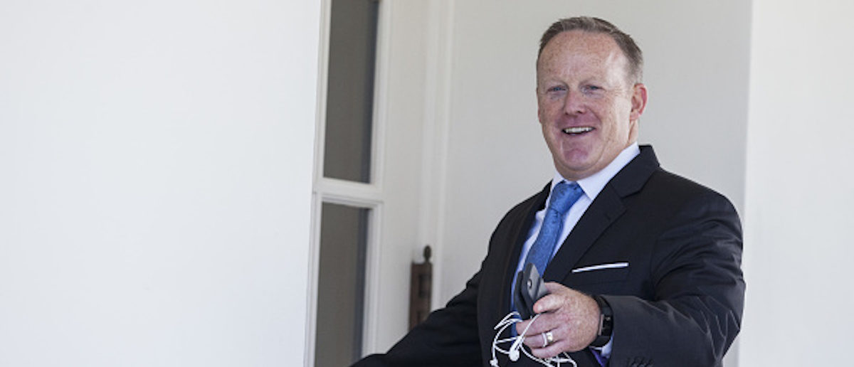 Sean Spicer, outgoing White House press secretary, gestures while entering the West Wing of the White House in Washington, D.C., U.S., on Tuesday, July 25, 2017. Donald Trump ratcheted up his criticism of Jeff Sessions on Tuesday, and a top aide said the president likely wants his attorney general gone and has recently considered firing the head of the FBI's Russia investigation. Photographer: Zach Gibson/Bloomberg via Getty Images