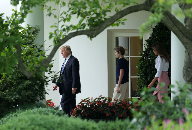 WASHINGTON, DC - JUNE 30: U.S. President Donald Trump comes out from the Oval Office with first lady Melania Trump and son Barron Trump prior to a South Lawn Marine One departure at the White House June 30, 2017 in Washington, DC. President Trump is spending the weekend with his family in Bedminster, New Jersey. (Photo by Alex Wong/Getty Images)