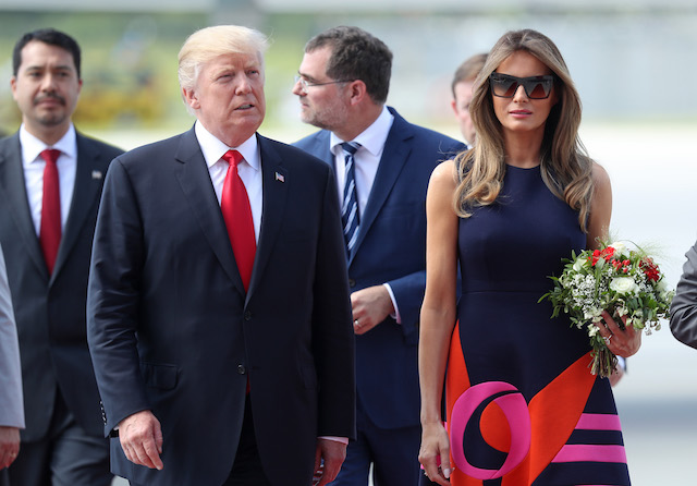 HAMBURG, GERMANY - JULY 06: U.S. President Donald Trump and First Lady Melania Trump arrive at Hamburg Airport for the Hamburg G20 economic summit on July 6, 2017 in Hamburg, Germany. Leaders of the G20 group of nations are meeting for the July 7-8 summit. Topics high on the agenda for the summit include climate policy and development programs for African economies. (Photo by Sean Gallup/Getty Images)