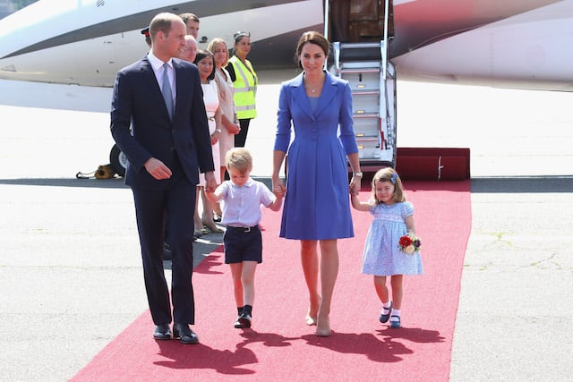 BERLIN, GERMANY - JULY 19: Prince William, Duke of Cambridge, Catherine, Duchess of Cambridge, Prince George of Cambridge and Princess Charlotte of Cambridge arrive at Berlin Tegel Airport during an official visit to Poland and Germany on July 19, 2017 in Berlin, Germany. (Photo by Chris Jackson/Getty Images)