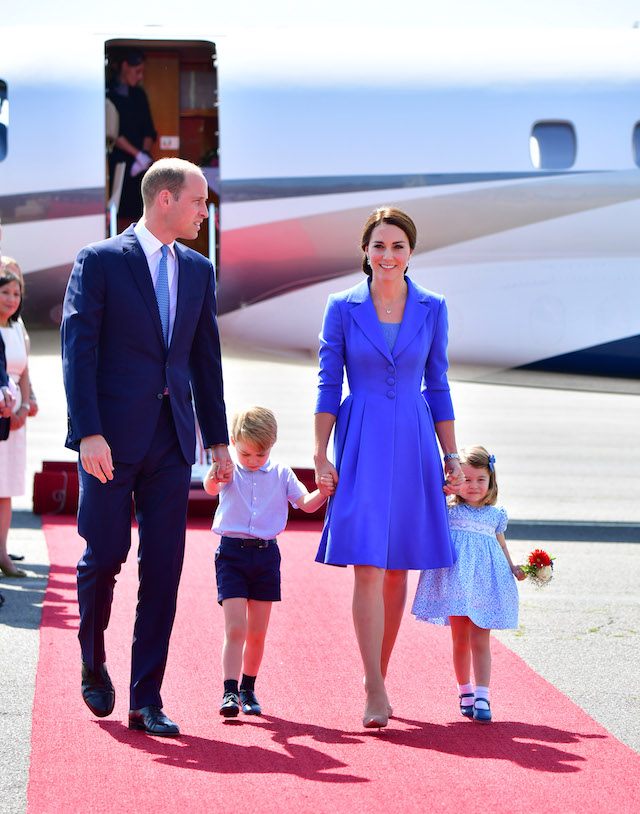 BERLIN, GERMANY - JULY 19: Prince William, Duke of Cambridge, Catherine, Duchess of Cambridge with Prince George of Cambridge and Princess Charlotte of Cambridge as they arrive at Berlin Tegel Airport during an official visit to Poland and Germany on July 19, 2017 in Berlin, Germany. (Photo by Robin Utrecht - Pool/Getty Images)