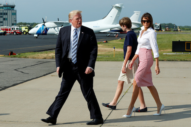 U.S. President Donald Trump with First Lady Melania Trump and their son Barron arrive at Morristown municipal airport, New Jersey, U.S., to spend a weekend at the Trump National Golf Club in Bedminster, New Jersey, June 30, 2017. REUTERS/Yuri Gripas - RTS19BOF