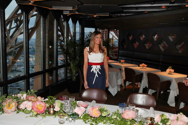 U.S. First lady Melania Trump smiles at the Jules Verne restaurant before a private dinner at the Eiffel Tower in Paris, France, July 13, 2107. REUTERS/Kevin Lamarque - RTX3BD6B