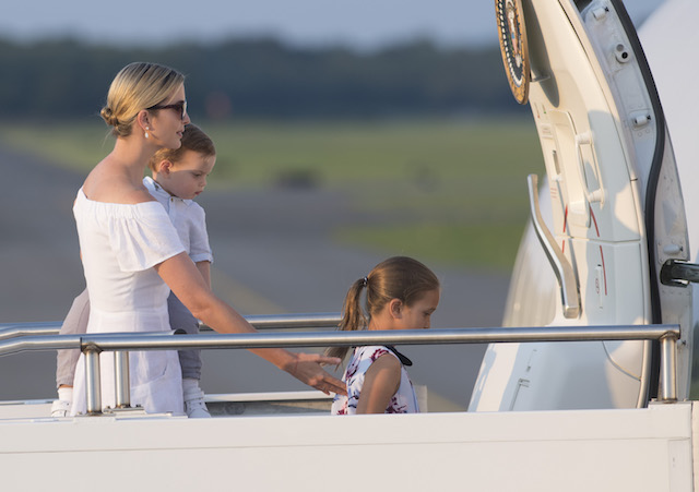 Ivanka Trump, daughter of US President Donald Trump, along with her children, Arabella (L) and Theodore, board Air Force One prior to departure Morristown Municipal Airport in Morristown, New Jersey, August 20, 2017, as Trump returns to Washington, DC, following a 17-day vacation at his property in Bedminster, New Jersey. / AFP PHOTO / SAUL LOEB (Photo credit should read SAUL LOEB/AFP/Getty Images)