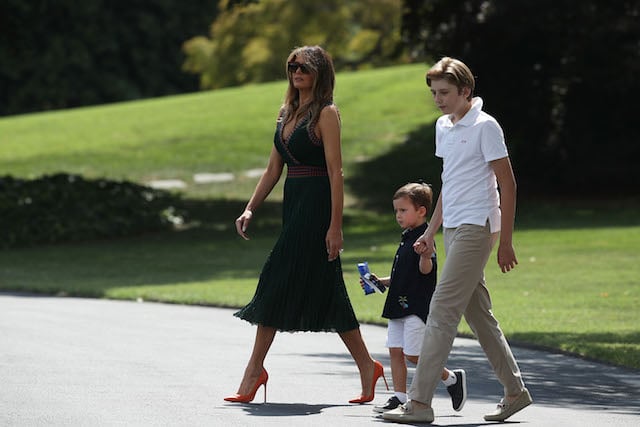 WASHINGTON, DC - AUGUST 25: U.S. first lady Melania Trump (L) walks with son Barron (R), and grandson Joseph Frederick Kushner (2nd L) towards the Marine One on the South Lawn of the White House prior to a departure August 25, 2017 in Washington, DC. President Trump is spending the weekend with his family at Camp David. (Photo by Alex Wong/Getty Images)