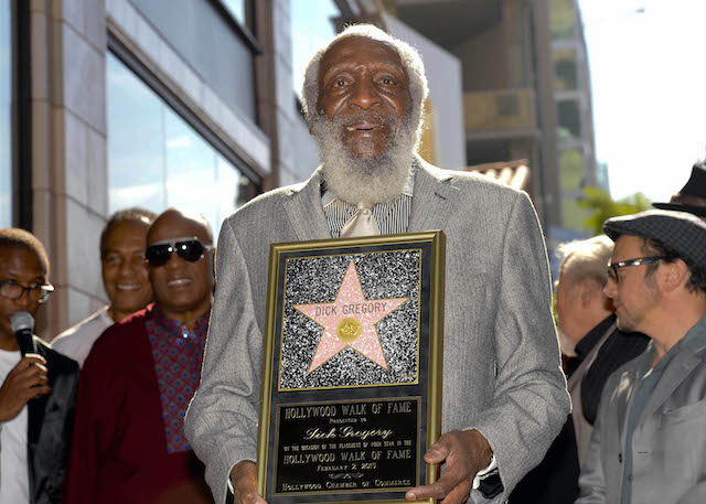 Comedian Dick Gregory receives his star on Star on the Hollywood Walk of Fame in Los Angeles, California February 2, 2015. REUTERS/Gus Ruelas (UNITED STATES - Tags: ENTERTAINMENT) - RTR4NZ3J