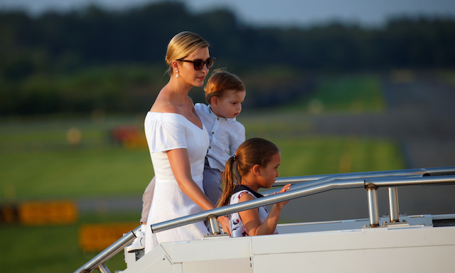 Ivanka Trump with children Arabella and son Theodore board Air Force One in Morristown, New Jersey, U.S., on their way back to Washington August 20, 2017. REUTERS/Kevin Lamarque - RTS1CKVL