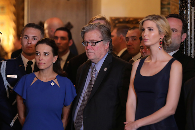 Senior adviser Steve Bannon stands between Deputy National Security Advisor for Strategy Dina Powell and Ivanka Trump as President Donald Trump delivers a statement about missile strikes on a Syrian airfield, at Trump's Mar-a-Lago estate in West Palm Beach, Florida, April 6, 2017. REUTERS/Carlos Barria