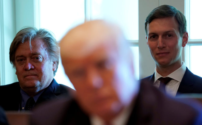 Trump advisers Steve Bannon (L) and Jared Kushner (R) listen as President Donald Trump meets with members of his Cabinet at the White House in Washington, June 12, 2017. REUTERS/Kevin Lamarque