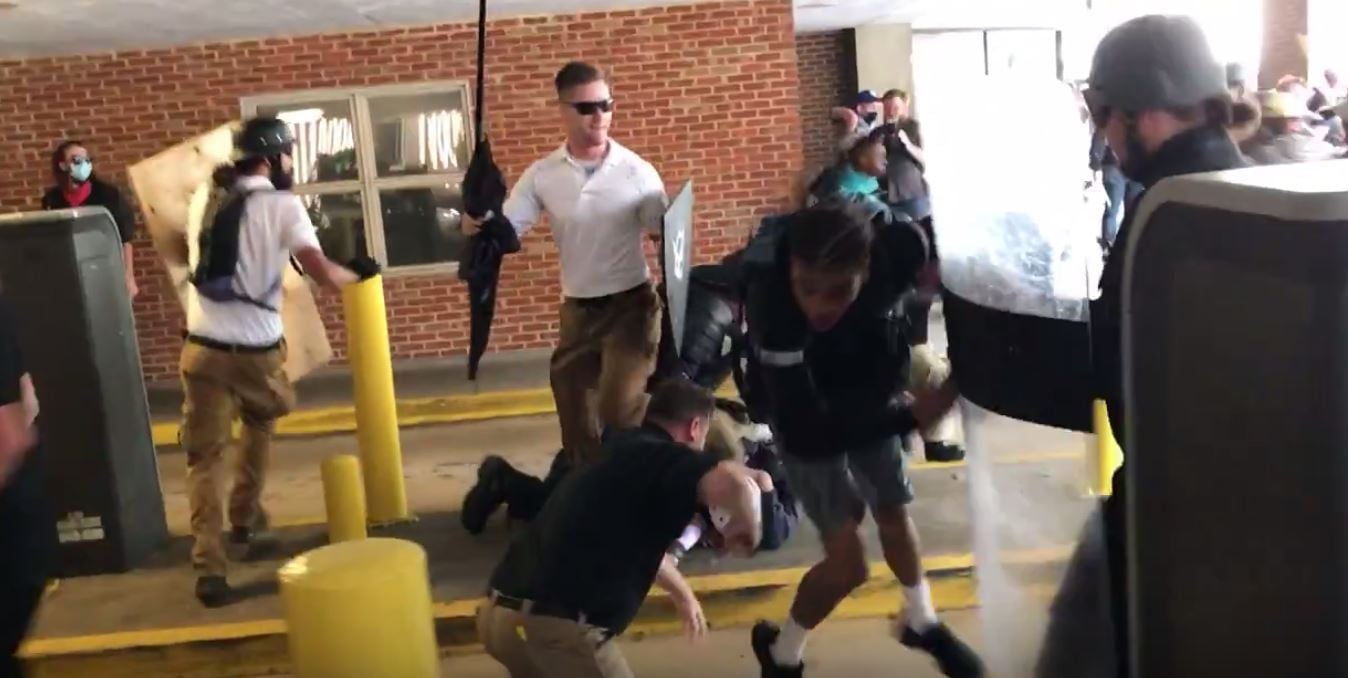 Video shows white supremacists beating a young African American man senselessly. (Brenton Roy/TheDCNF)