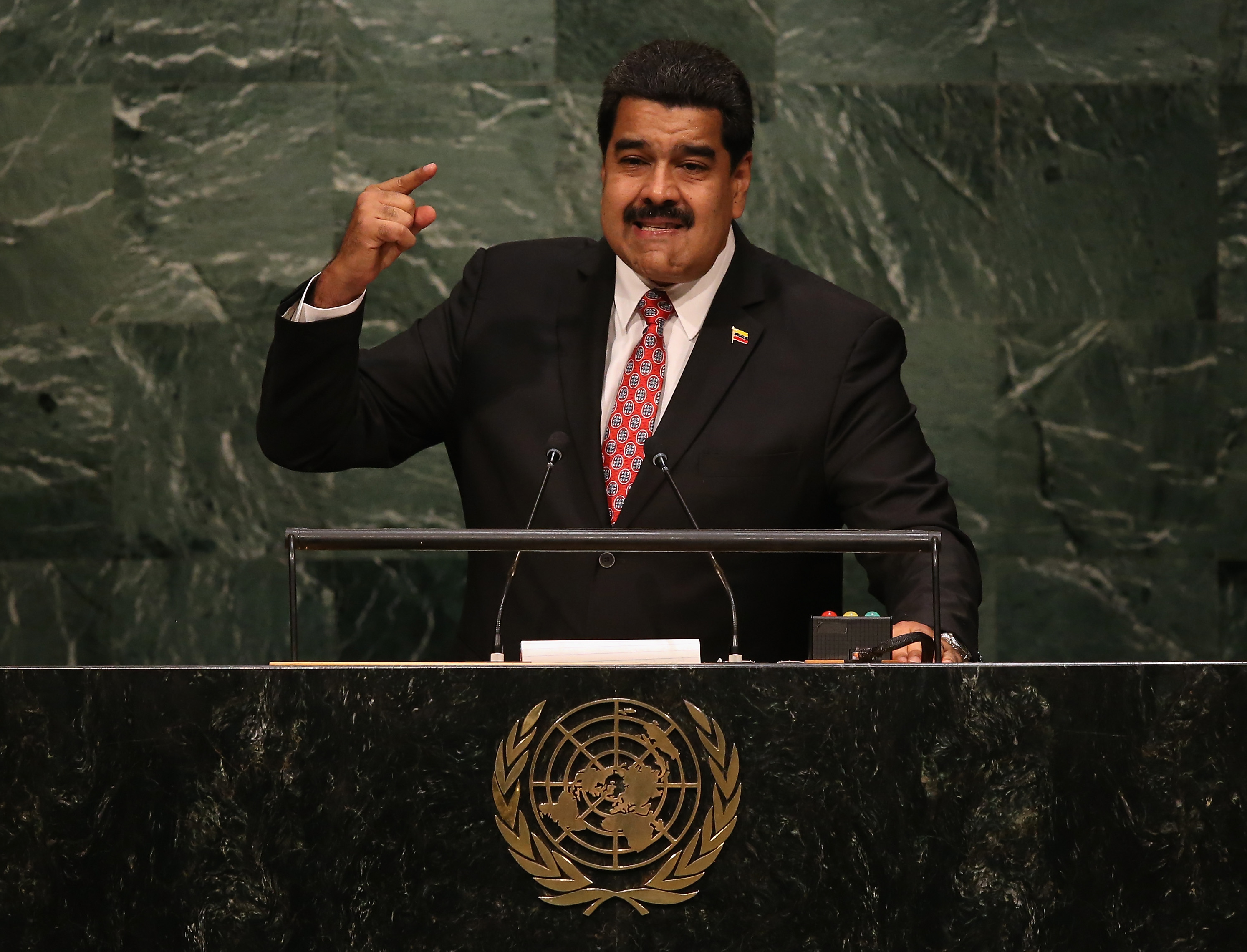 NEW YORK, NY - SEPTEMBER 29: Nicolas Maduro, President of Venezuela, addresses the United Nations General Assembly at UN headquarters on September 29, 2015 in New York City. World leaders gathered for the 70th annual UN General Assembly meeting. Maduro was holding a copy of the historic Jamaica Letter, written by revolutionary leader Simon Bolivar in 1815. (Photo by John Moore/Getty Images)