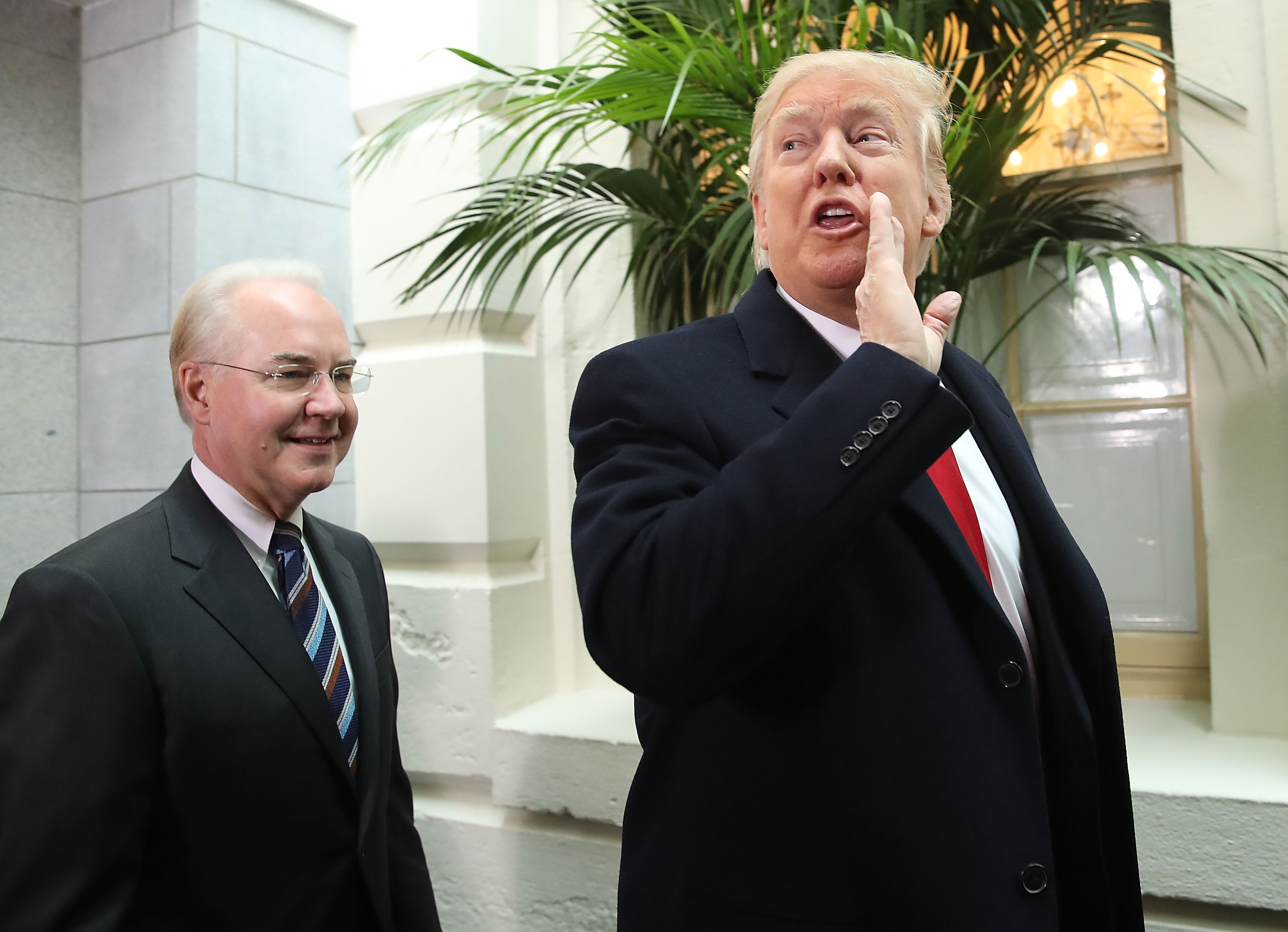 WASHINGTON, DC - MARCH 21: U.S. President Donald Trump and HHS Secretary Tom Price walk to a House Republican closed party conference on Capitol Hill, on March 21, 2017 in Washington, DC. President Trump is urging House Republicans to support his American Health Care Act. (Photo by Mark Wilson/Getty Images)